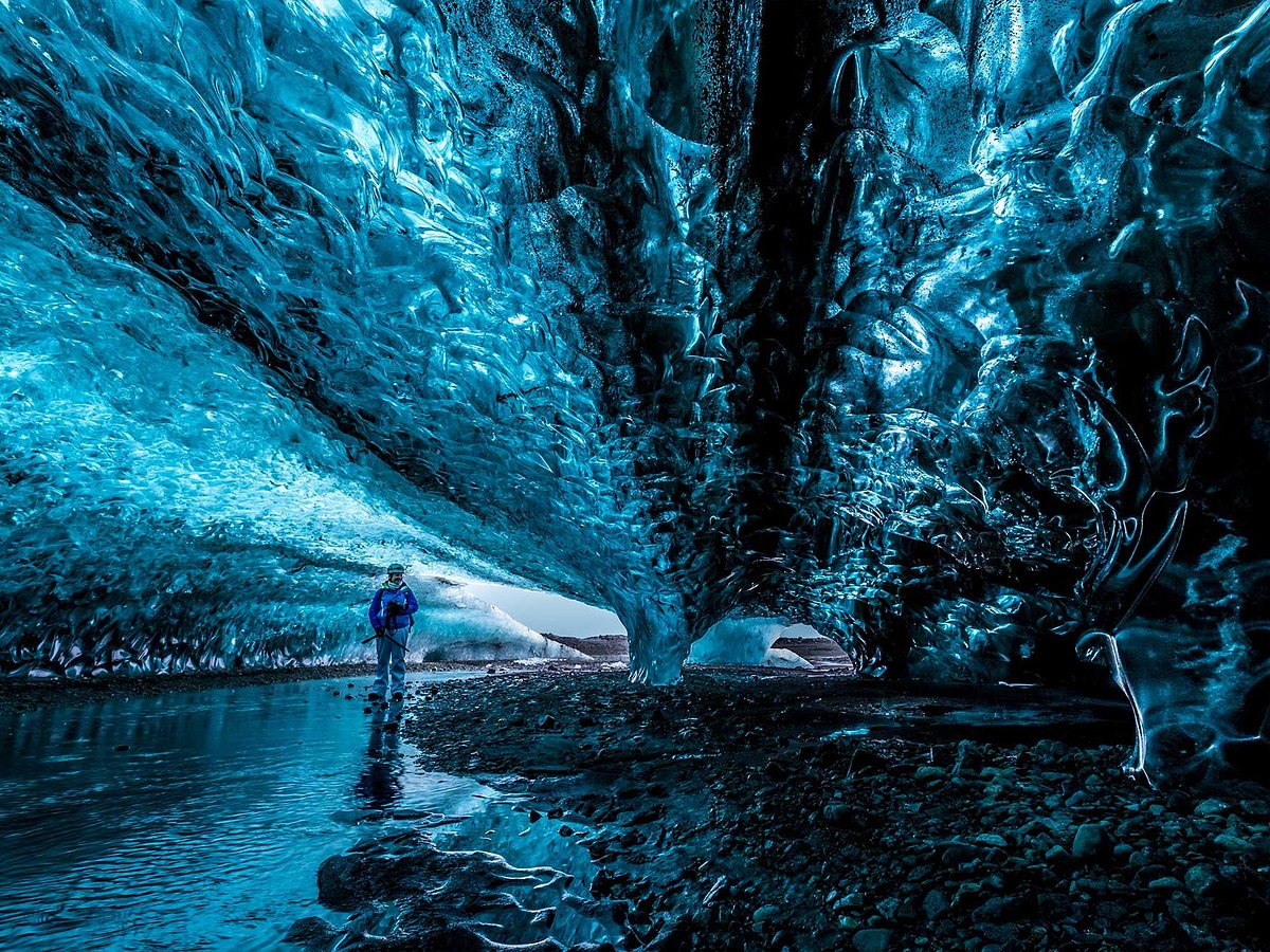 A dramatic fjord landscape in Iceland with mist and water